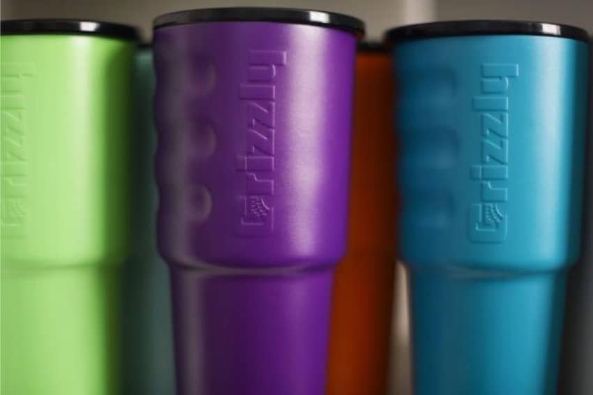 close up of lime, purple, red and teal 32 oz grizzly grip cups