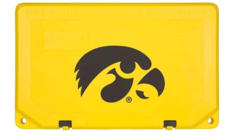 yellow grizzly cooler lid with black iowa hawkeyes logo