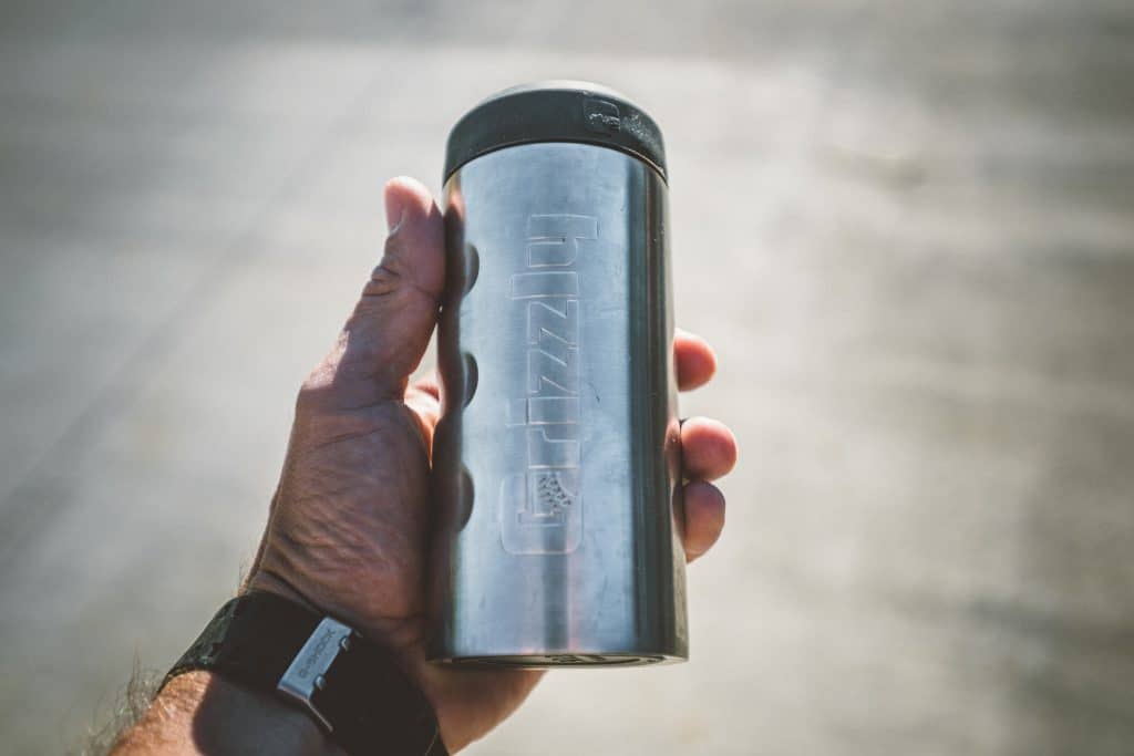 Grizzly Coolers Drinkware, Slim Can Koozie In Palm Of A Hand