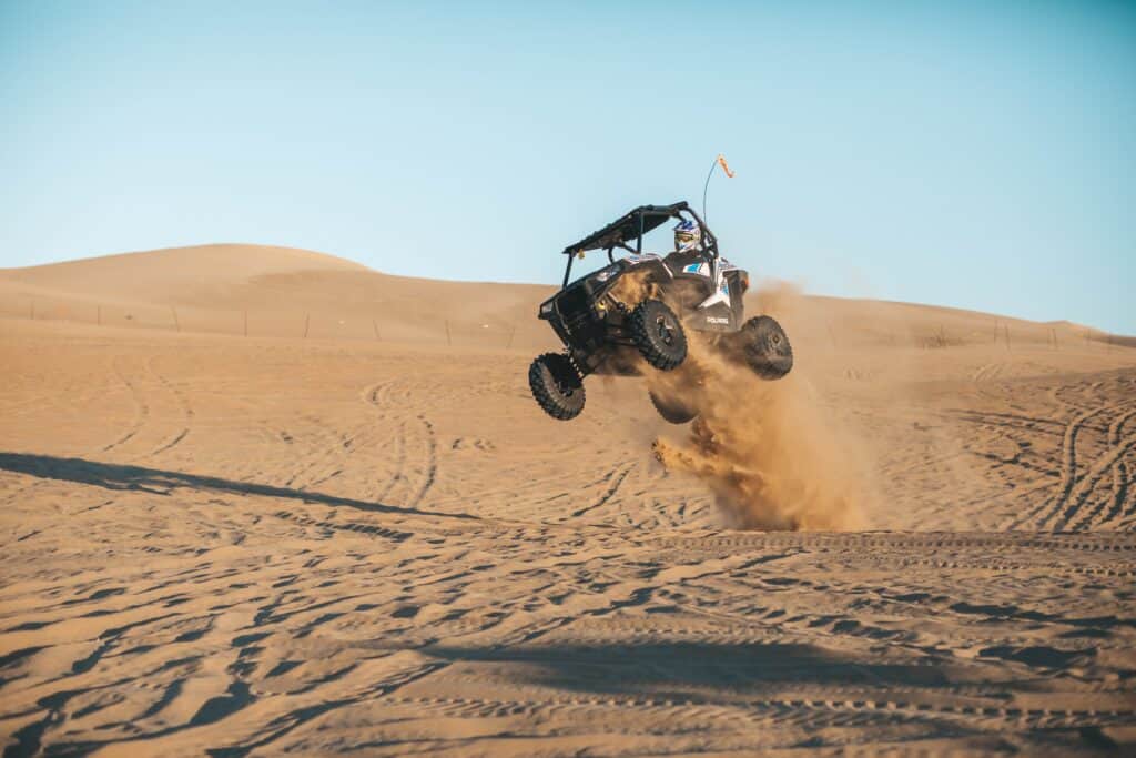 atv jumping sand dune