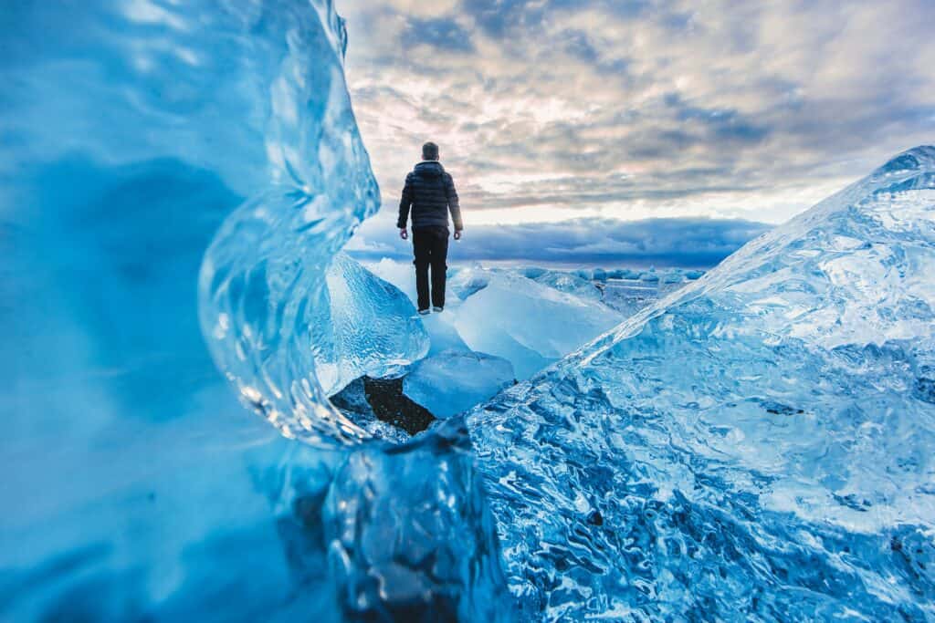 Man Walking On Glacier